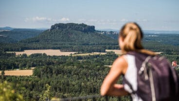 A hiker looking south from the Brand viewing area near Waitzdorf