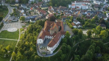 An aerial view of of Bad Iburg with the Schloss Iburg in the foreground